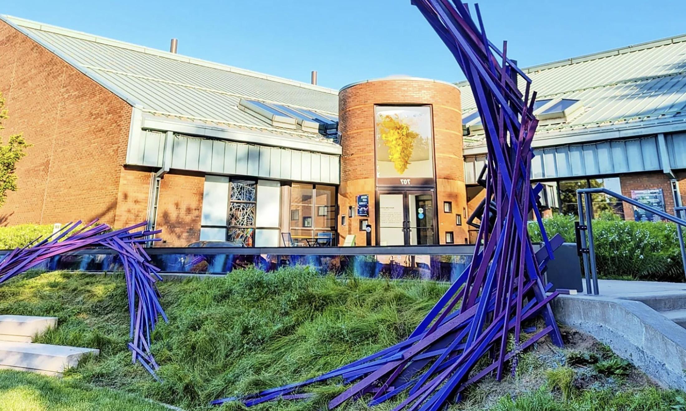 Oakland University Associate Professor of Theatre Jeremy Barnett and theatre alumnus Jason Maracani recently unveiled a new art installation in the East Garden of the Krasi Art Center in St. Joseph, M